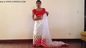 Hot girl wearing saree showing navel