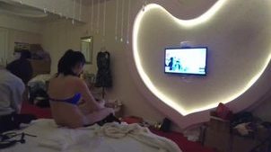 Chinese lingerie model changing clothes in room with hidden camera