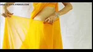 Sexy teen wearing saree and showing her boobs and assets